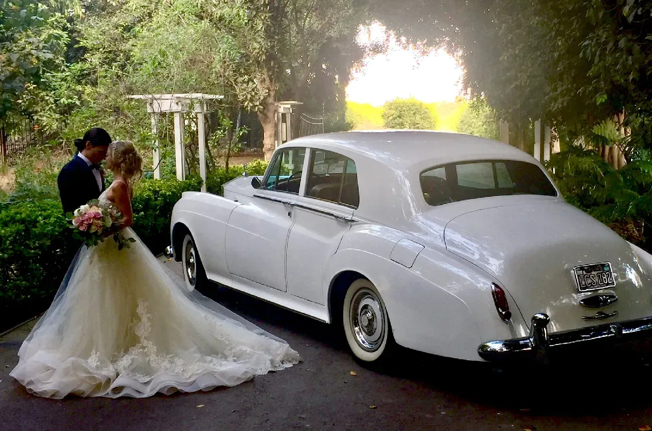 White 1960 Rolls Royce Silver Cloud II exterior for wedding car rental