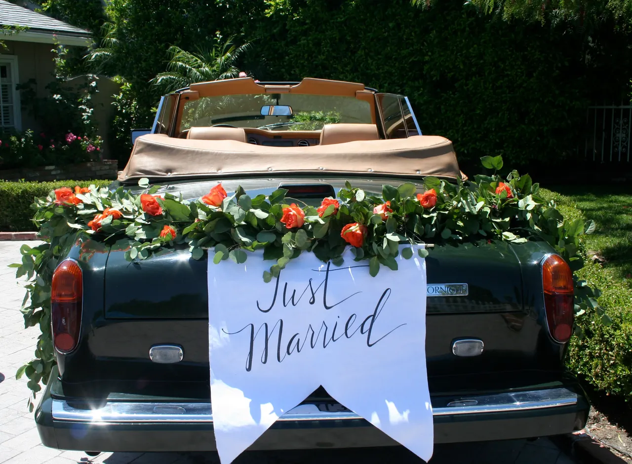 Green 1983 Rolls-Royce Corniche Convertible exterior with convertible roof, photo 7 for wedding car rental