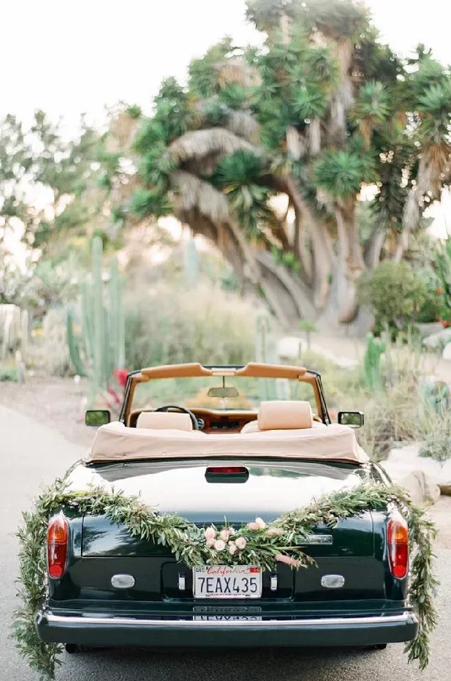 Green 1983 Rolls-Royce Corniche Convertible exterior with convertible roof, photo 10 for wedding car rental