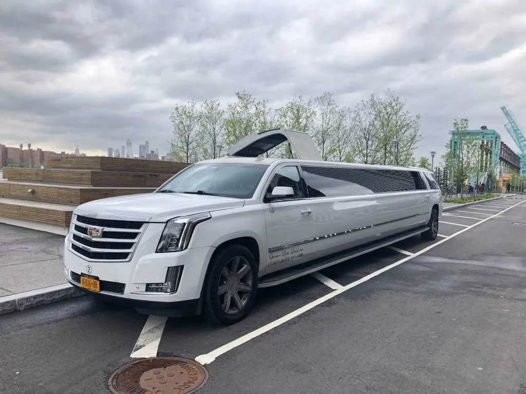White Cadillac Escalade Limousine for limo rental in New York