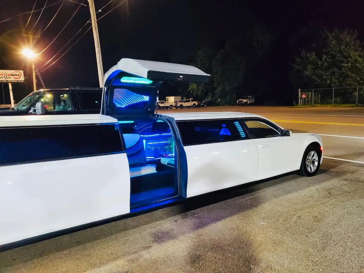 White Chrysler 300 Jet Doors with bridal (jet) door for limo rental
