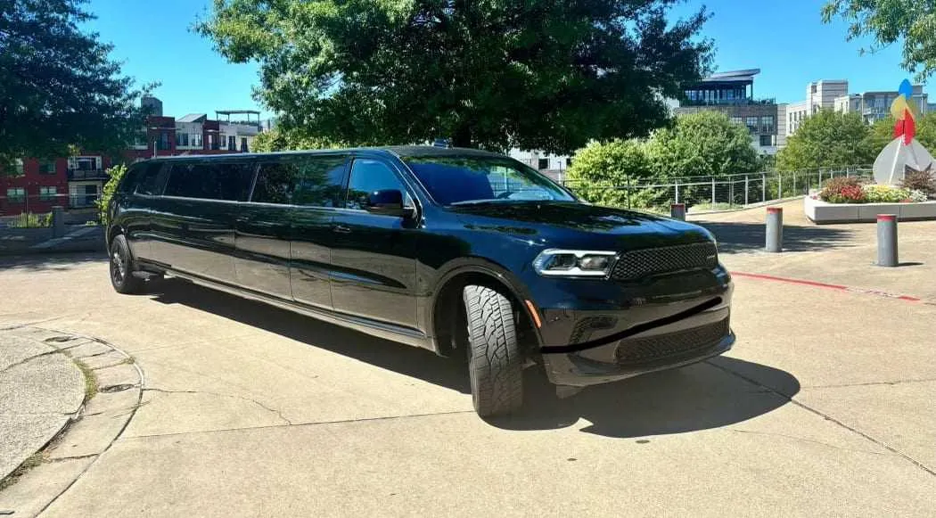 Black Dodge Durango Stretch Limo with tinted windows for limo rental