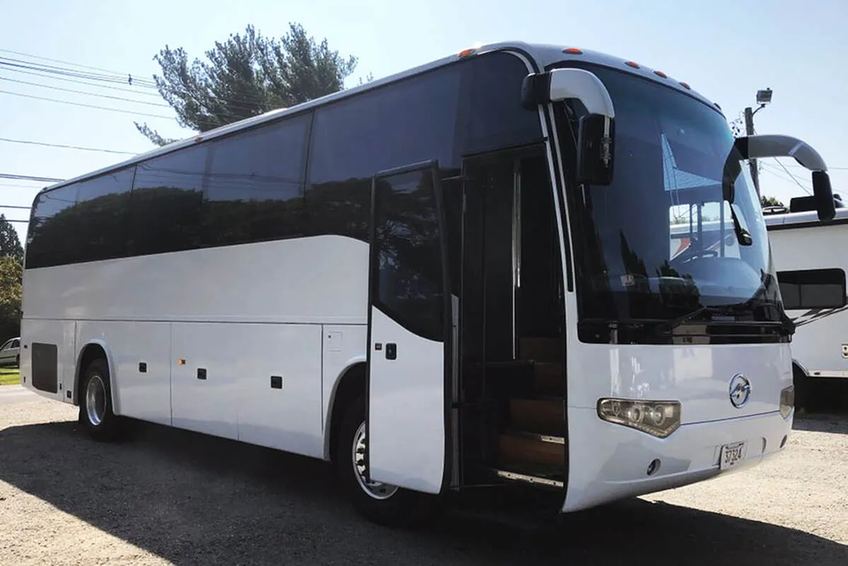 Entertainment Coach exterior with tinted windows for limo rental in North Attleboro, MA