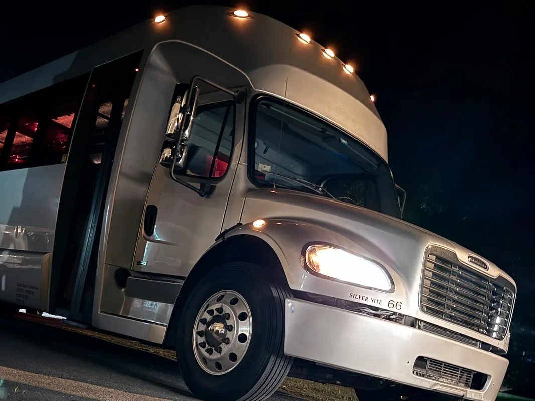 Silver Freightliner Party Bus exterior, photo 4 for limo rental in North Attleboro, MA