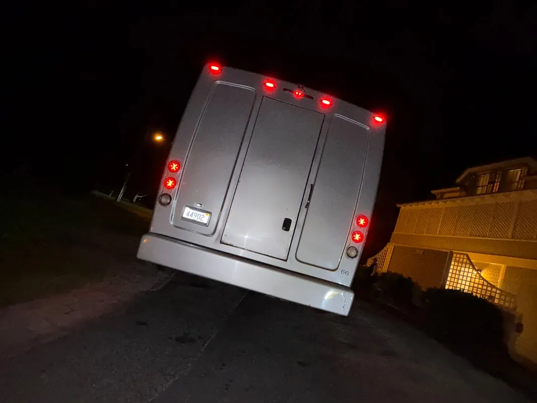 Silver Freightliner Party Bus exterior, photo 7 for limo rental in North Attleboro, MA