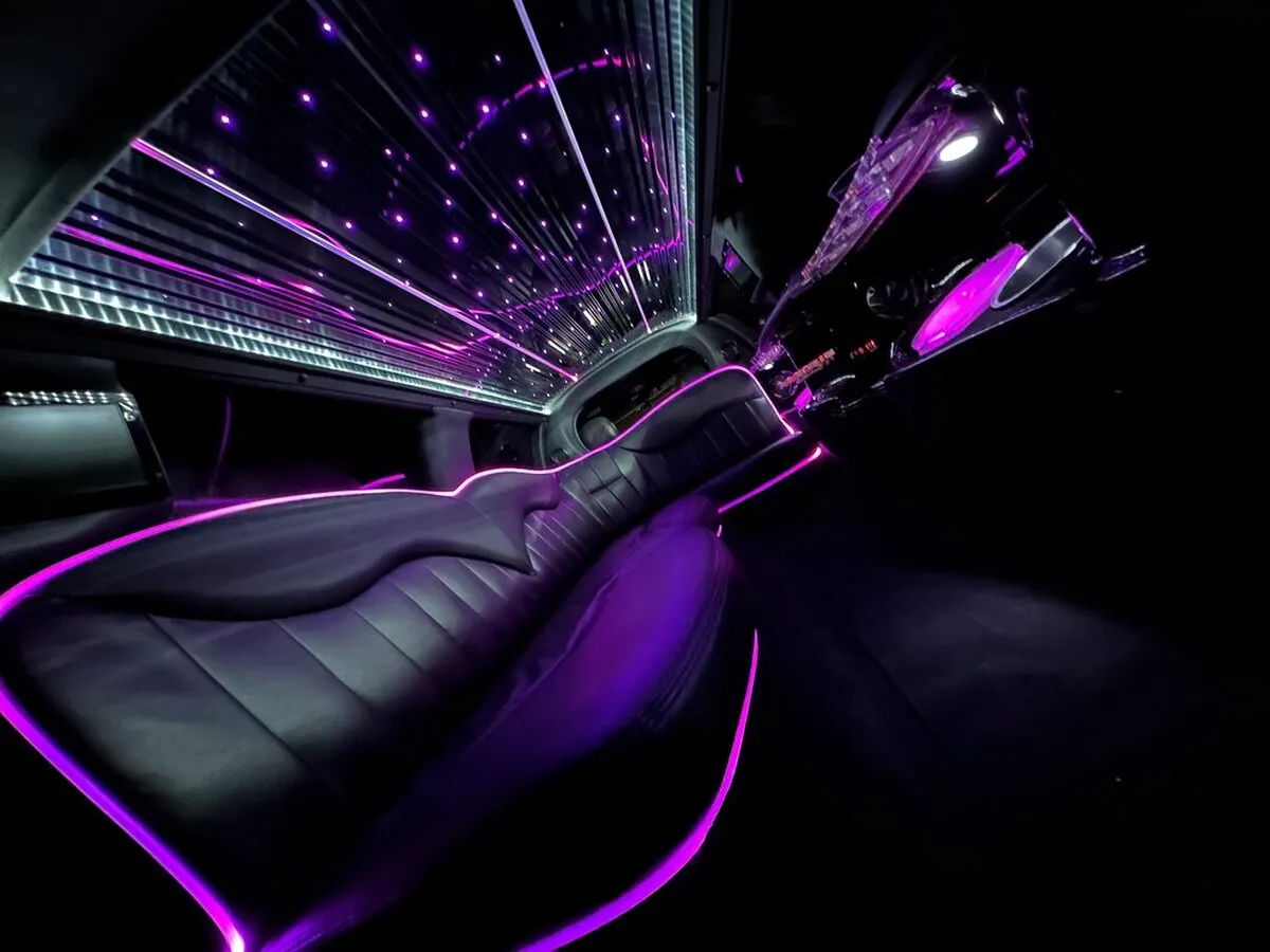 Lincoln Town Car Limousine interior with LED accent lighting, LED ceiling lighting and starlight or fiber-optic ceiling, photo 10 for limo rental in North Attleboro, MA