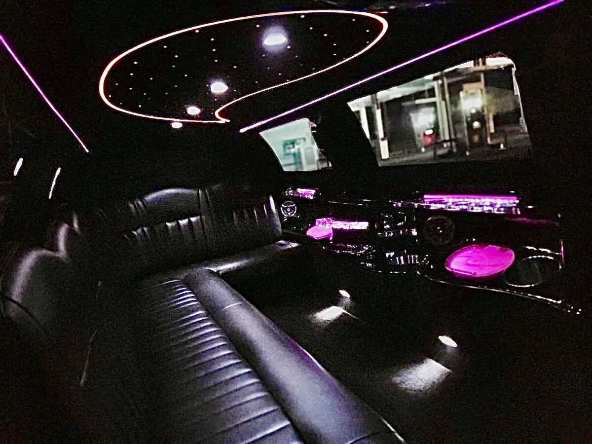 Lincoln Town Car Limousine interior with starlight or fiber-optic ceiling, photo 9 for limo rental