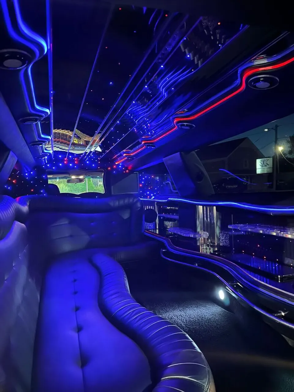 Lincoln Town Car Limousine interior with sofa-style seating, LED accent lighting and starlight or fiber-optic ceiling, photo 9 for limo rental in North Attleboro, MA