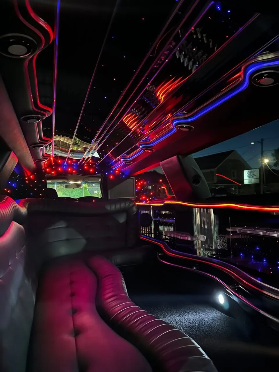 Lincoln Town Car Limousine interior with sofa-style seating, LED accent lighting and starlight or fiber-optic ceiling, photo 10 for limo rental in North Attleboro, MA