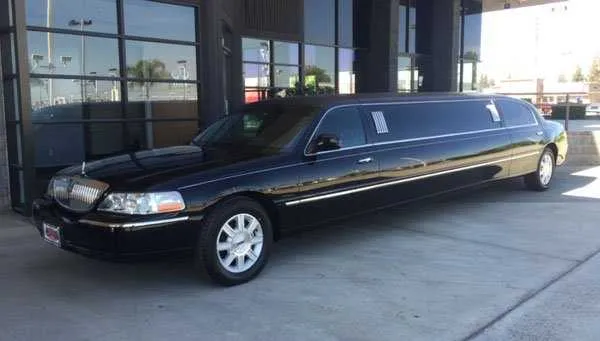 Black Lincoln Town Car Limousine rental: tinted windows