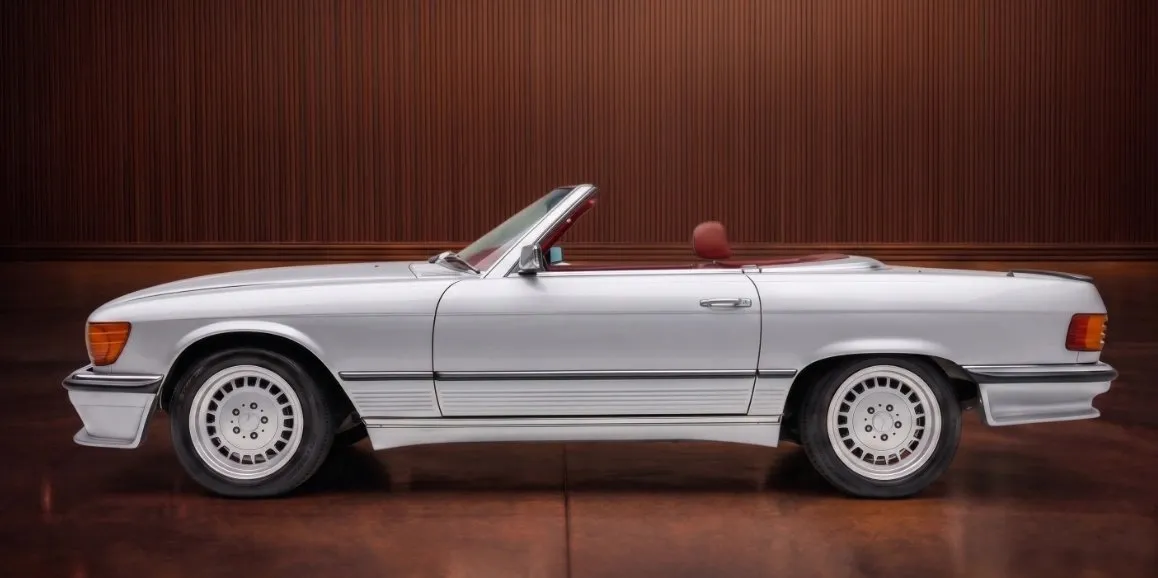 Silver Mercedes Benz 450 SL exterior with convertible roof for wedding car rental