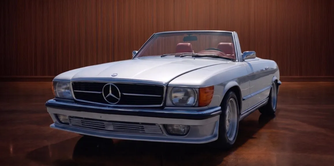 Silver Mercedes Benz 450 SL with convertible roof for wedding car rental