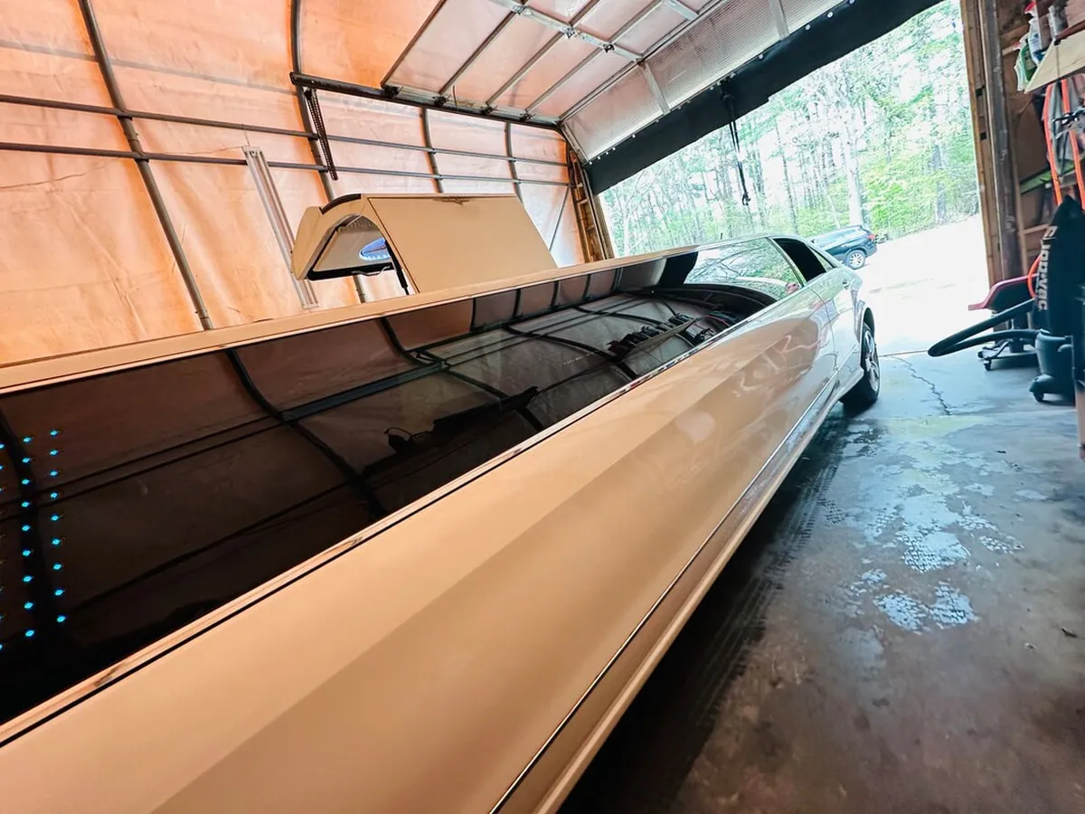 White Mercedes JET Doors Limousine exterior with tinted windows, photo 4 for limo rental