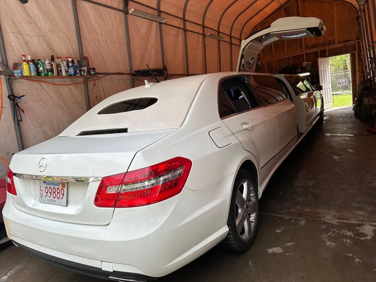White Mercedes-Benz Jet Doors Limousine exterior with bridal (jet) door for limo rental in North Attleboro, MA