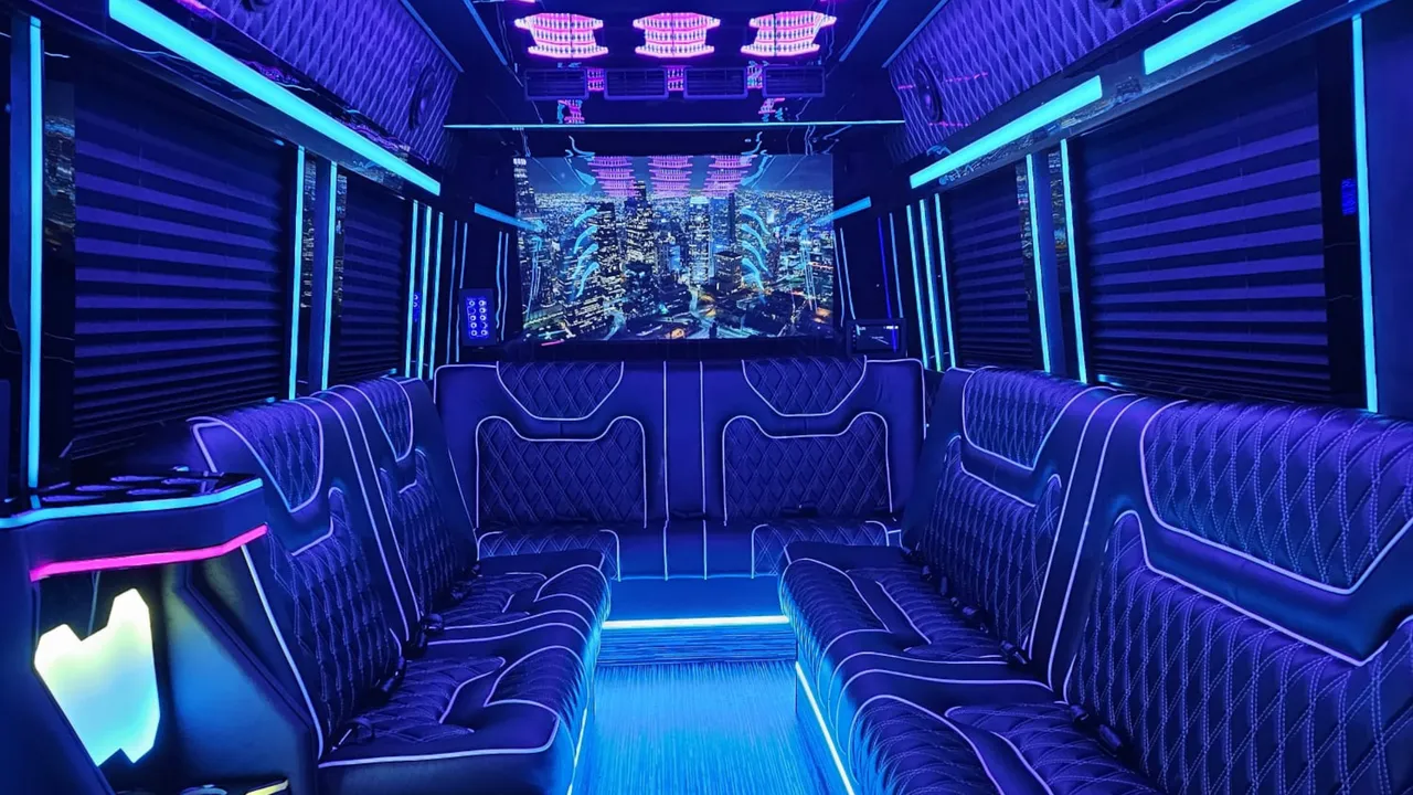 Mercedes-Benz Limousine Sprinter interior with perimeter lounge seating, sofa-style seating and window shades for limo rental in Queens Village, NY
