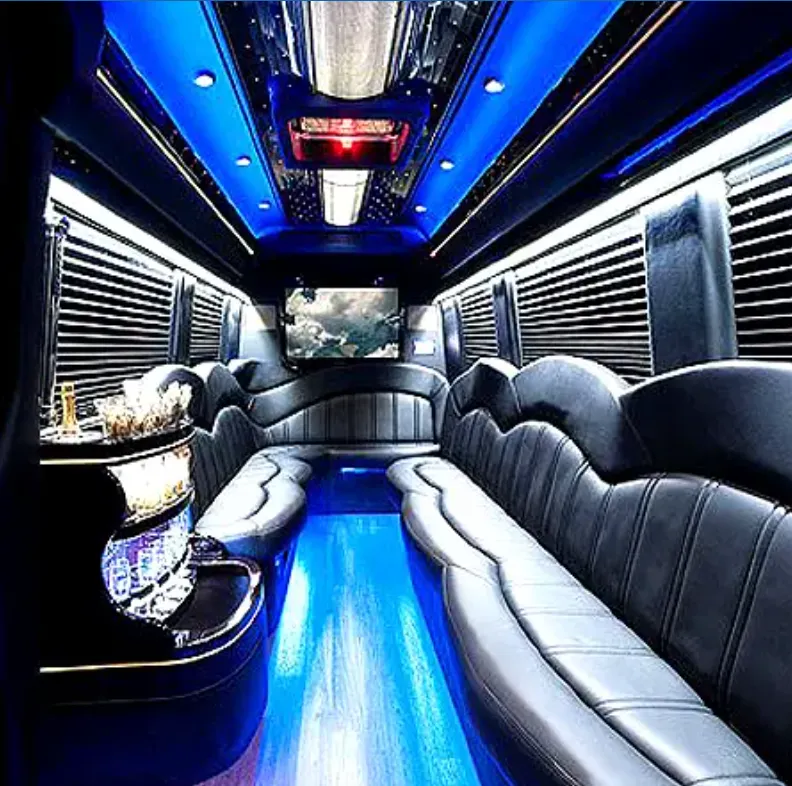 Mercedes-Benz Sprinter Limousine rental, interior view: perimeter lounge seating, sofa-style seating and window shades