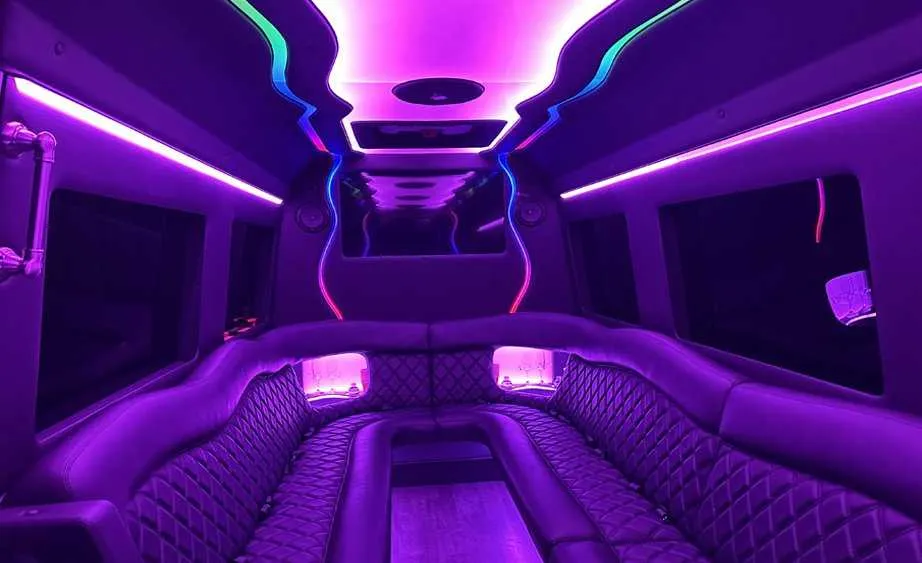 Mercedes-Benz Sprinter Limousine rental, interior view: perimeter lounge seating and LED accent lighting