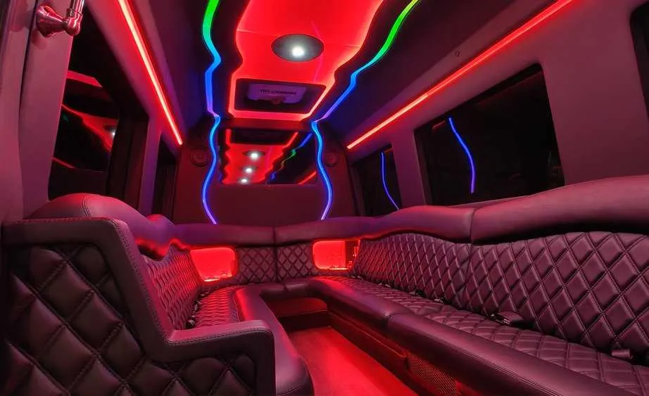 Mercedes-Benz Sprinter Limousine rental, interior view: perimeter lounge seating and LED accent lighting #5