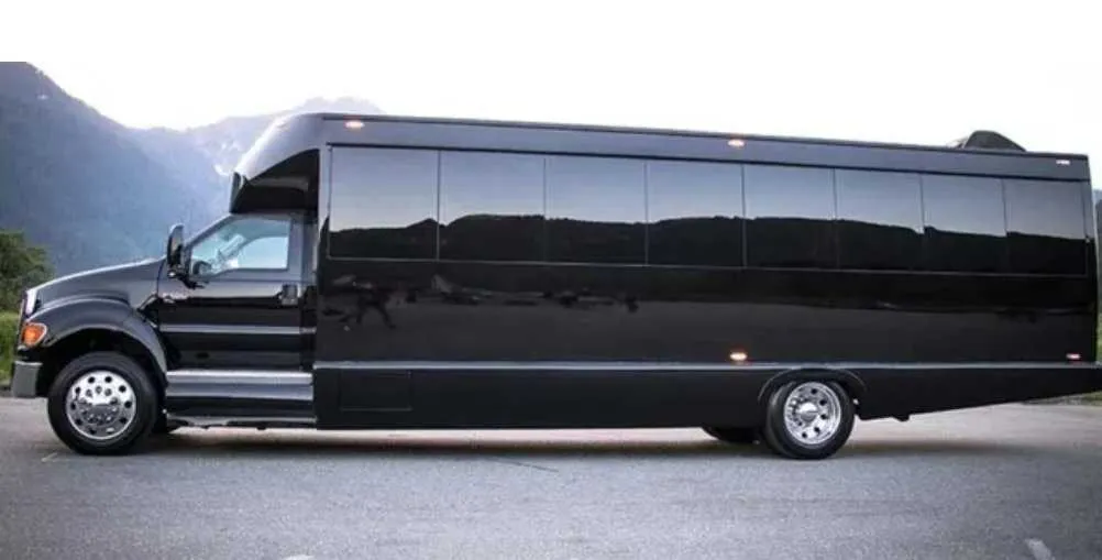 Black 30 Passenger Party Bus limo rental, bodywork: tinted windows