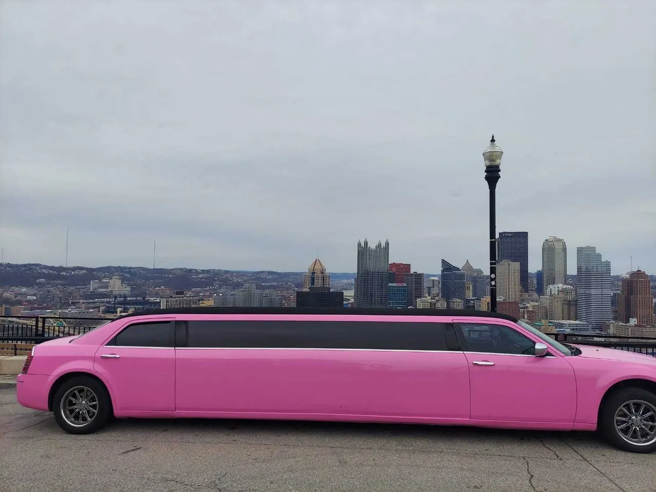 Pink Limo with tinted windows for limo rental