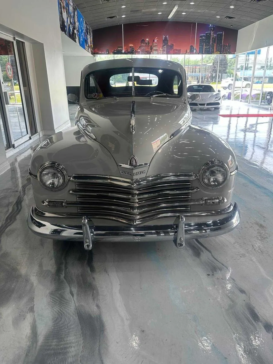 Silver Plymouth Classic exterior for wedding car rental Silver Plymouth Classic exterior for wedding car rental
