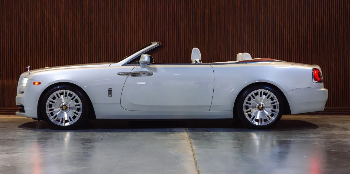White Rolls Royce Dawn exterior with convertible roof for wedding car rental